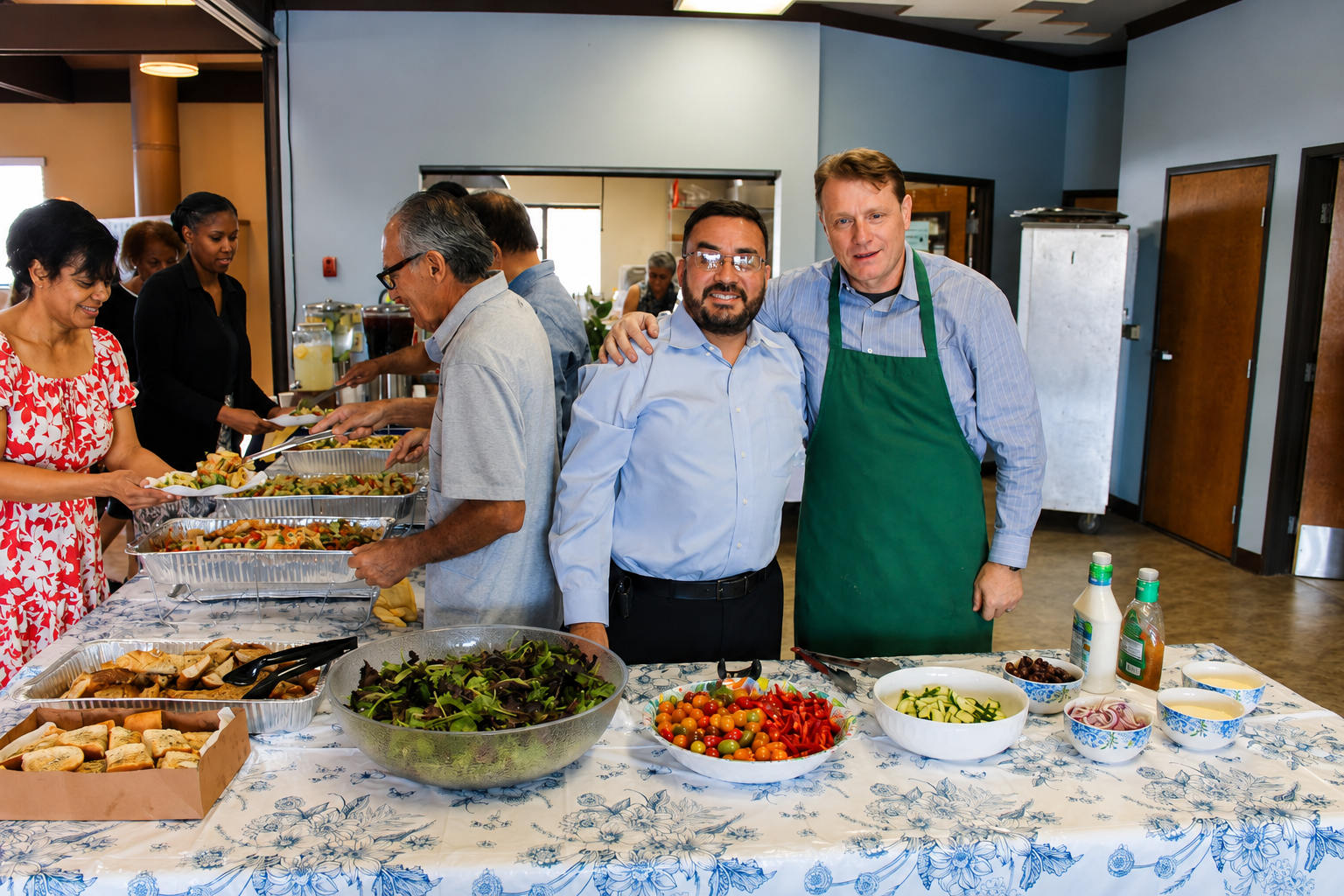 Neighbors sharing a community meal in a sunlit Norwalk hall